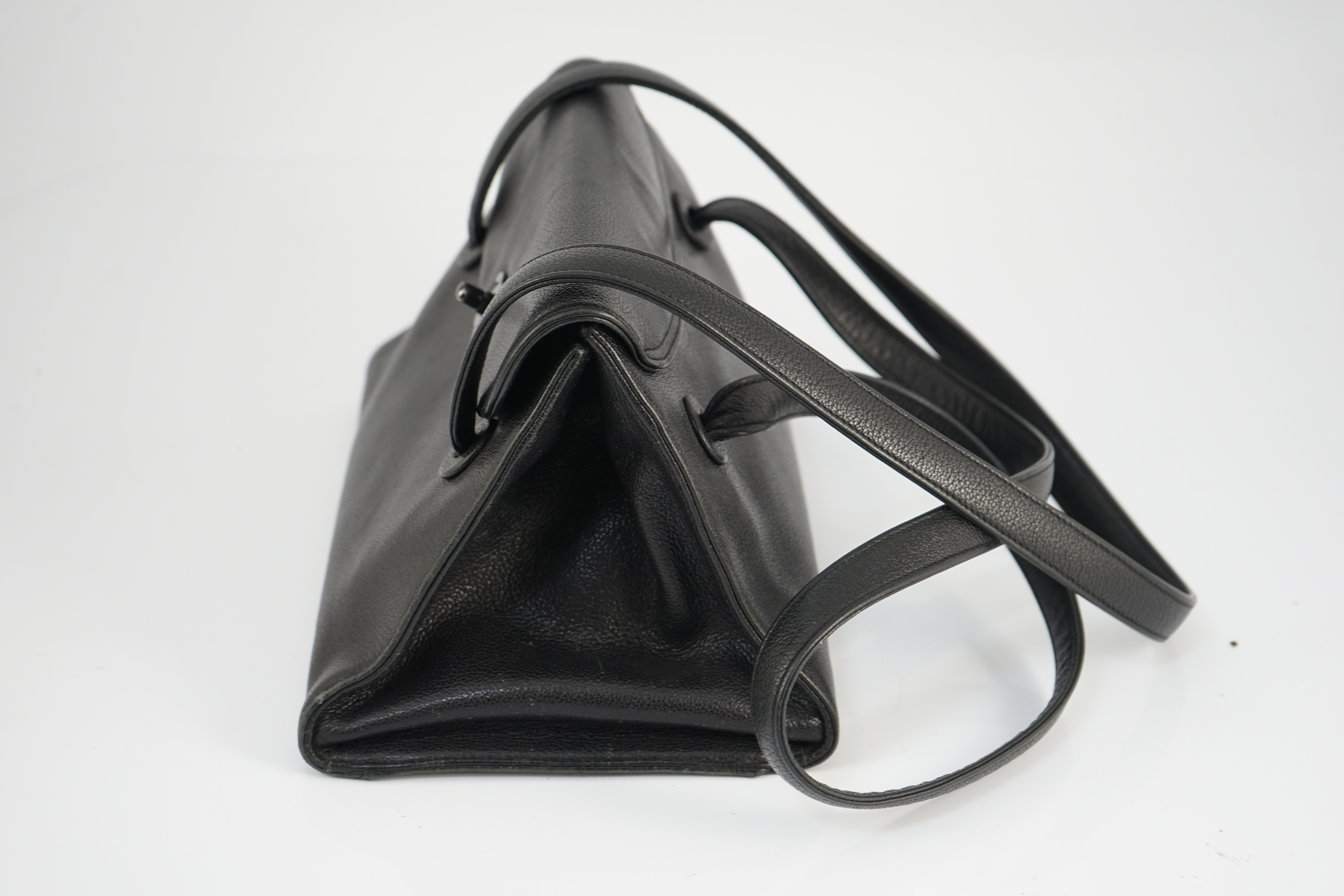 A black Chanel CC shoulder bag width 28cm, depth 17.5cm, length 19cm